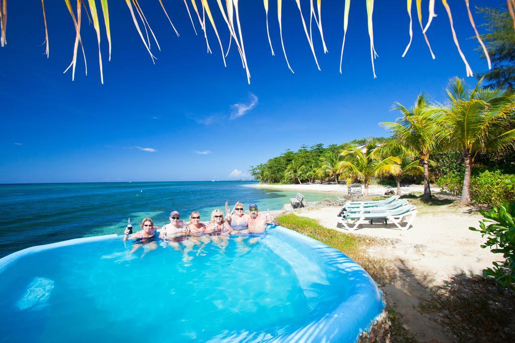 Las Rocas Resort And Dive Center West Bay Esterno foto